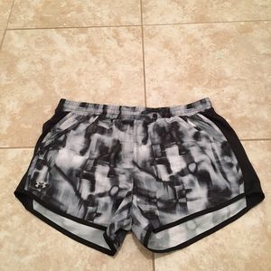 Women’s Under Armour fly by shorts.